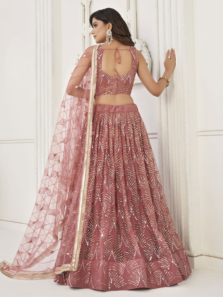 Mesmerizing Dusty Pink Thread Work Net Reception Wear Lehenga Choli